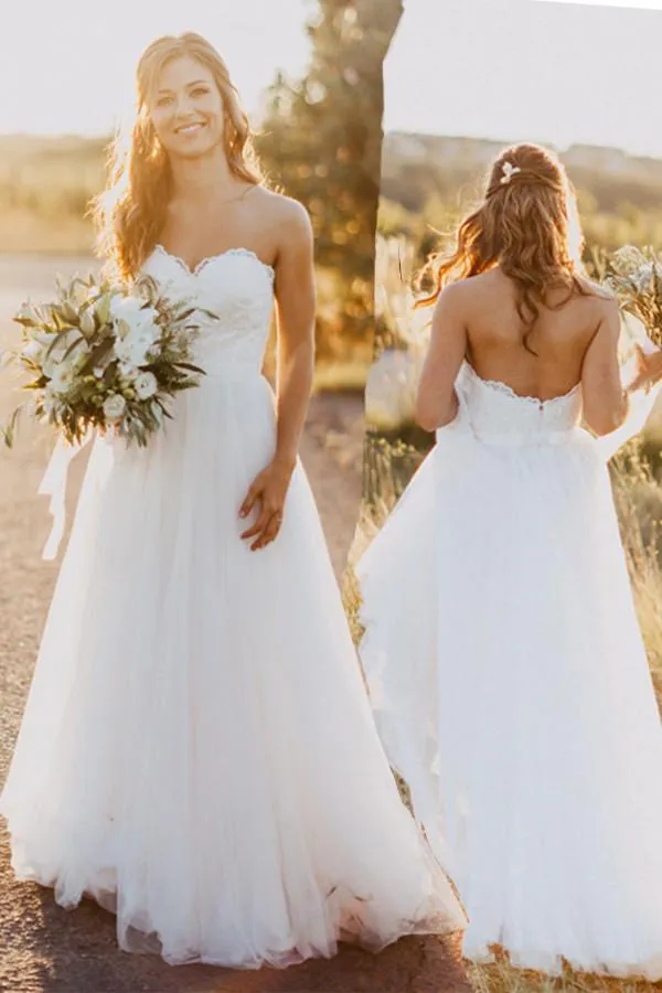 Strapless Ivory Tulle Wedding Dress With Lace Appliques